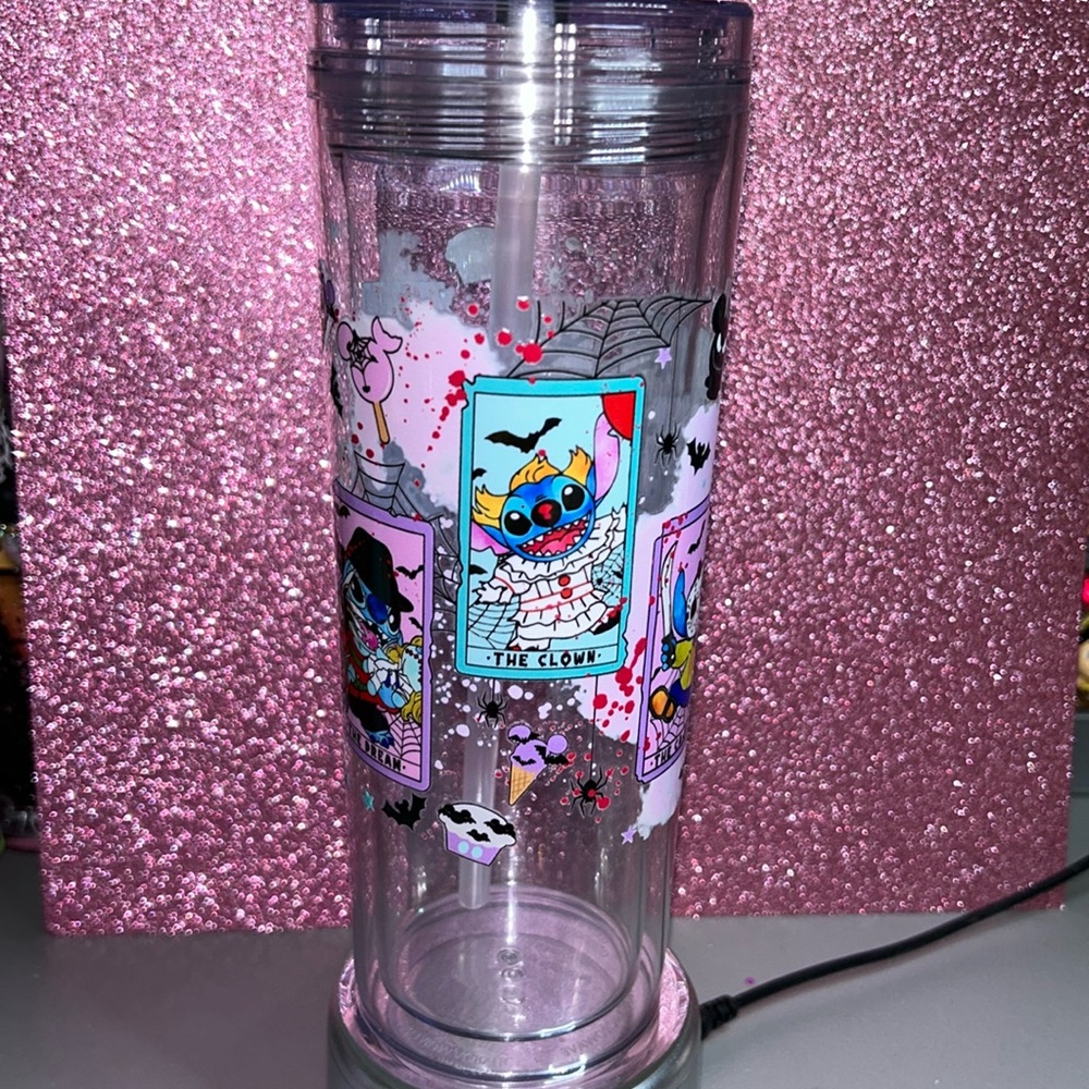 Hand Wrapped 18 ounce acrylic tumbler with Spooky UVDTF wrap